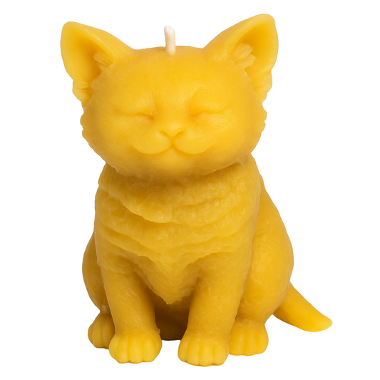 Yellow cat-shaped candle on a white background