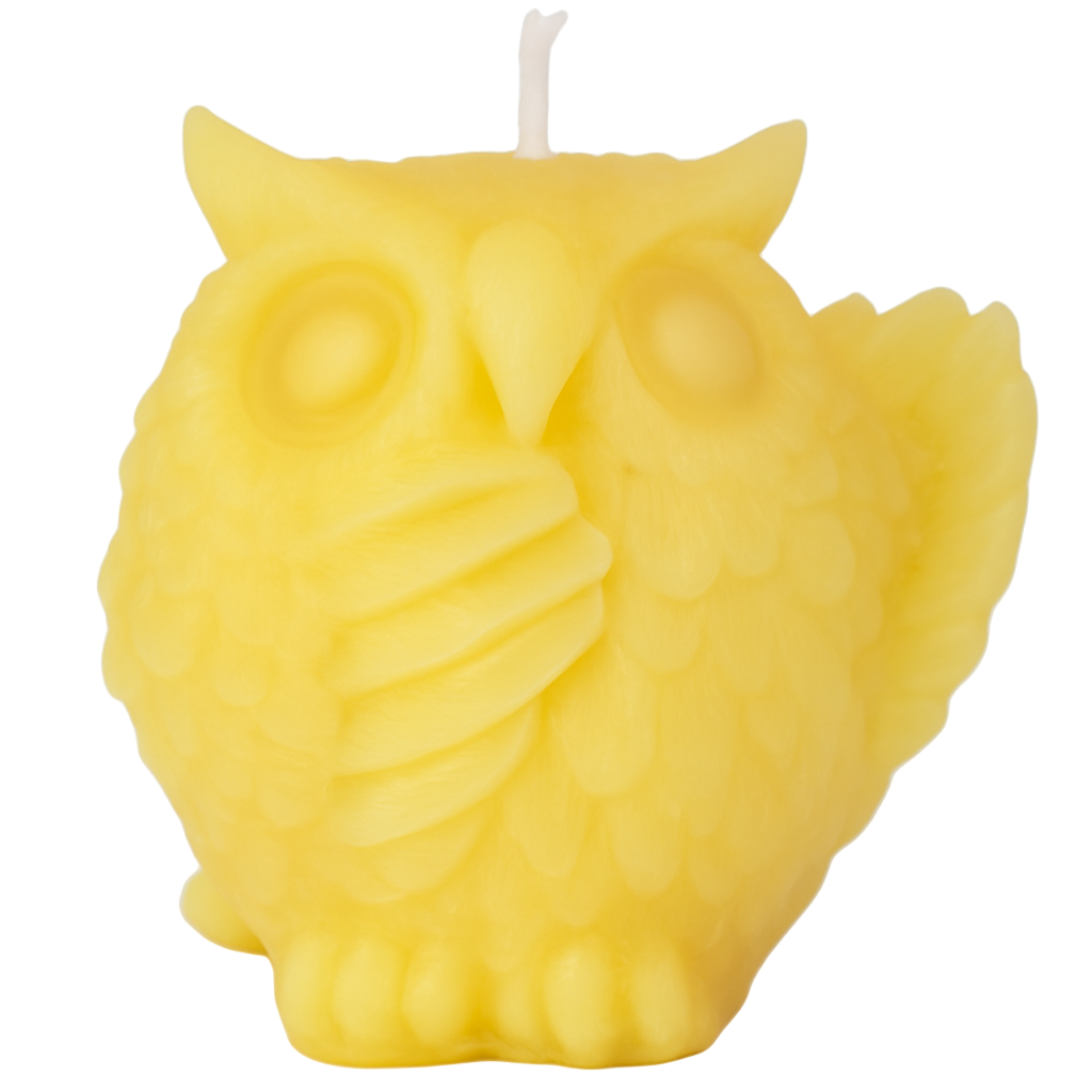 Yellow owl-shaped candle on a white background
