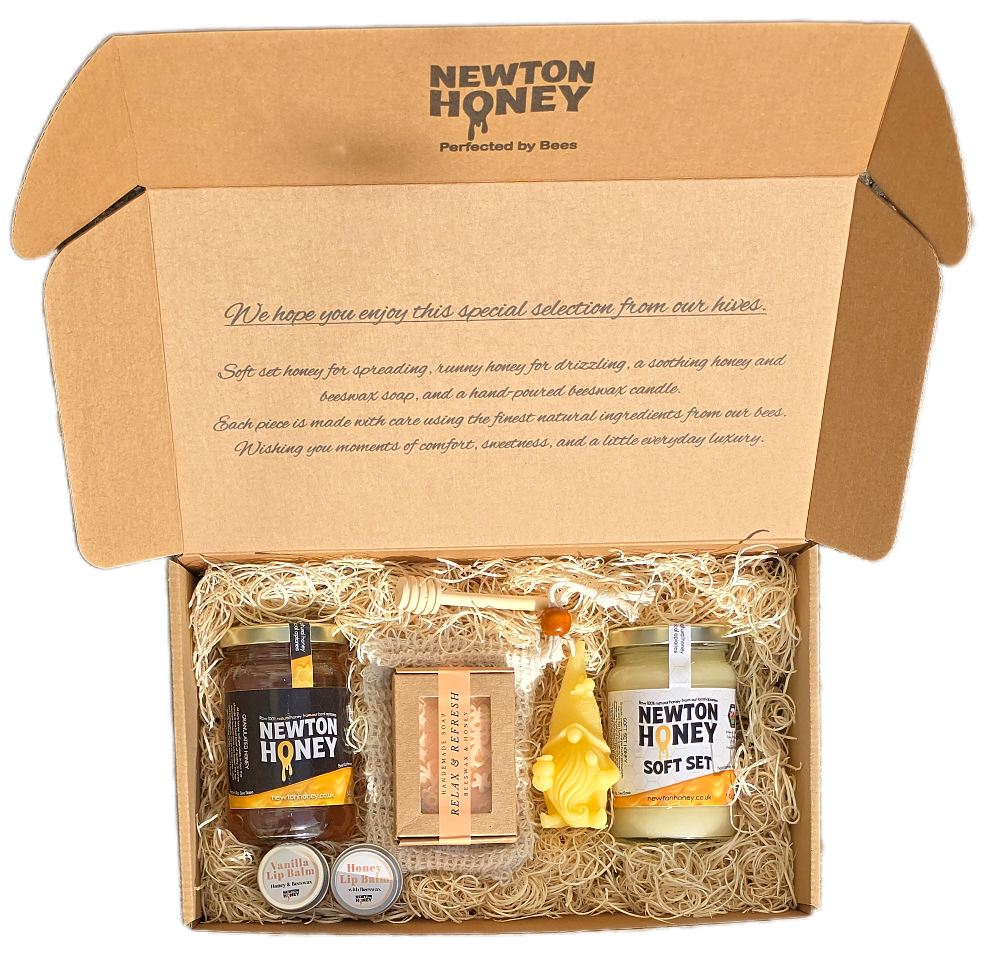 Newton Honey Luxury Gift Box featuring soft set and runny honey jars, handmade beeswax and honey soap, beeswax candle, and natural lip balms in an eco-friendly kraft presentation box