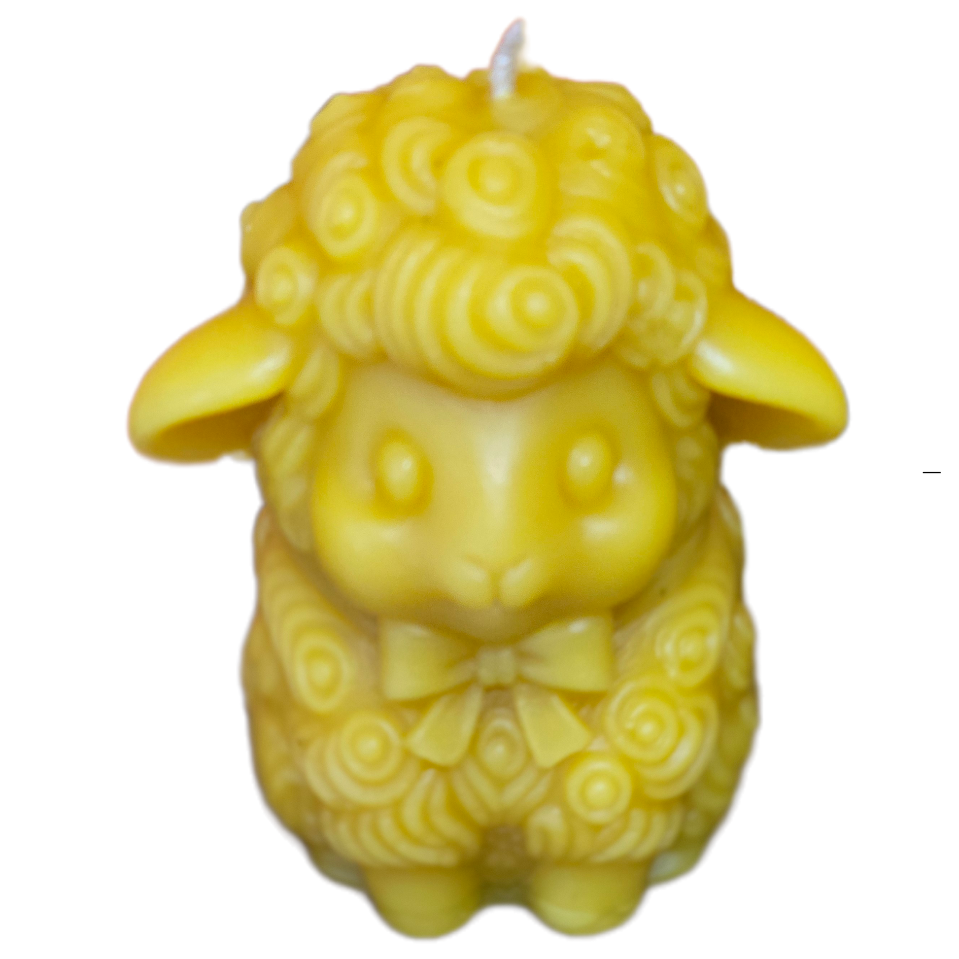 Handcrafted sheep-shaped beeswax candle with detailed curls made from pure beeswax